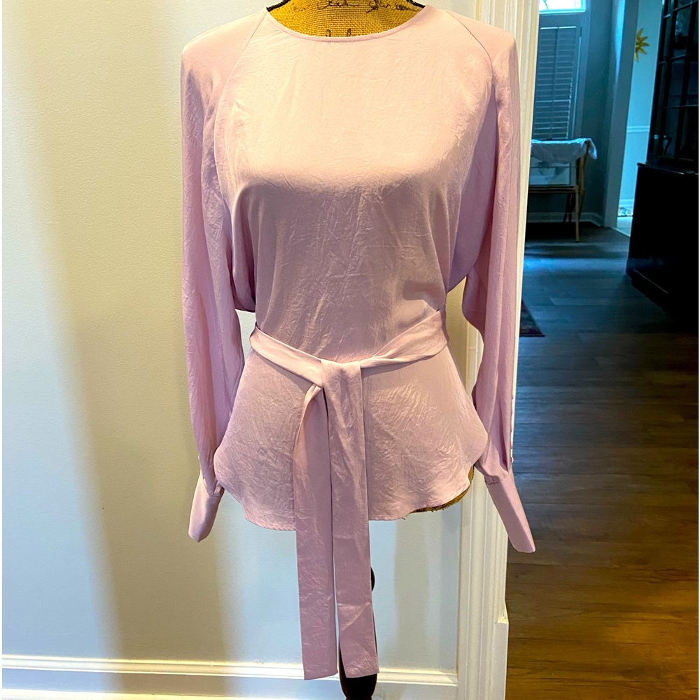 Jason Wu beautiful lavender color wrap top in a size 4.